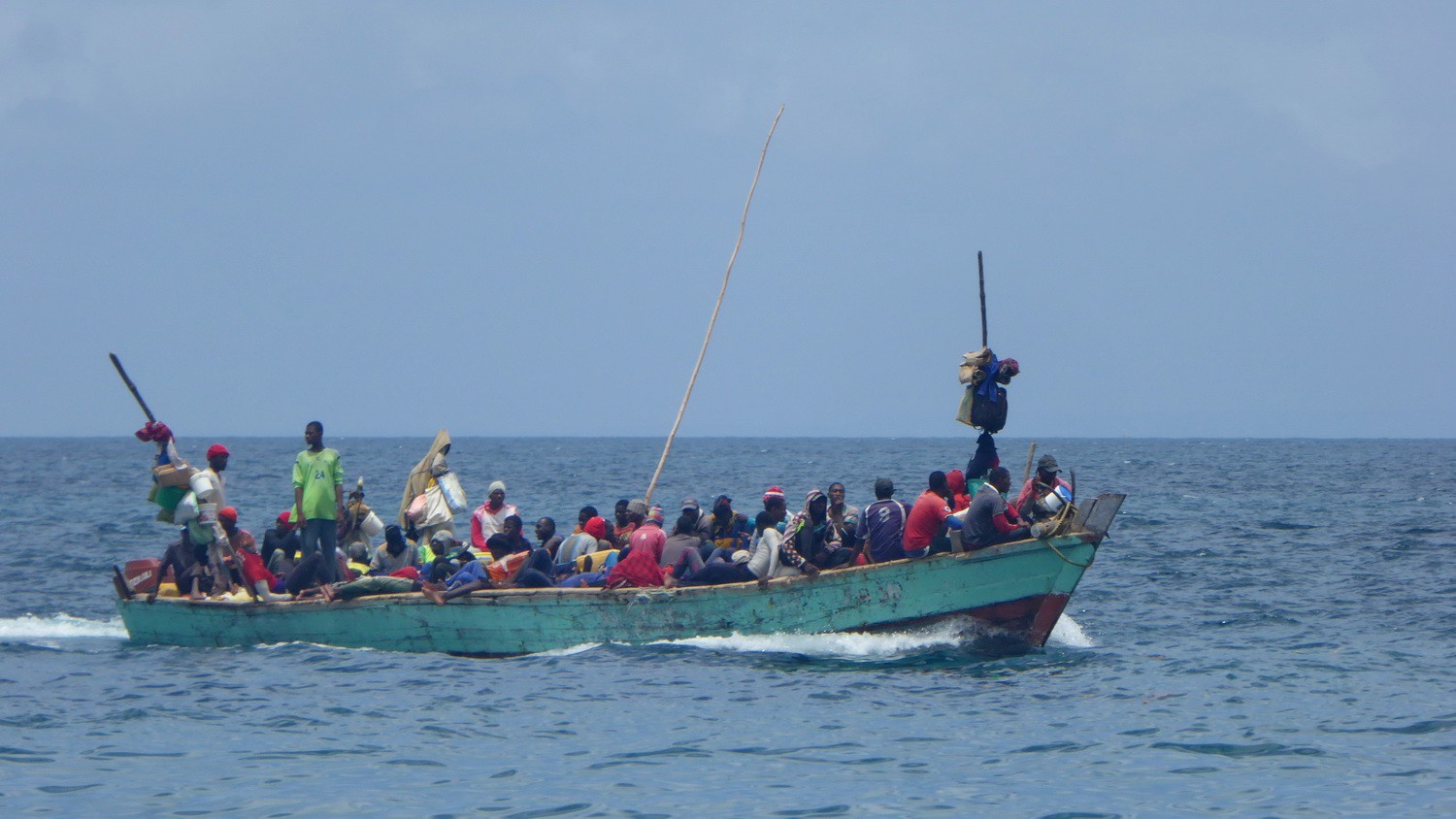 Crowded little boat on the Indian Ocean